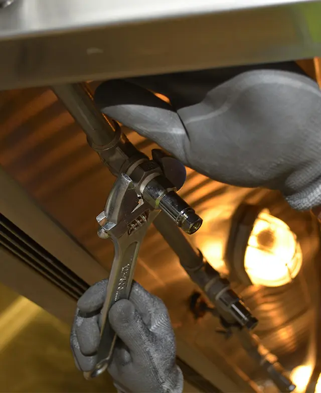 Professional plumber at work